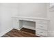 Built-in white desk features drawers and storage, ideal for a home office setup at 1229 Margo Mannor Dr, Fort Mill, SC 29708
