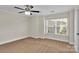 Bedroom with natural light, carpet floor and neutral walls at 127 Walnut Cove Dr # D, Mooresville, NC 28117