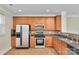 Functional kitchen featuring stainless steel appliances and ample cabinet space at 127 Walnut Cove Dr # D, Mooresville, NC 28117