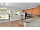 Eat-in kitchen with stainless steel appliances and sliding door to backyard at 127 Walnut Cove Dr # D, Mooresville, NC 28117