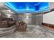Beautiful home theater with tiered seating, soft carpet, a starry ceiling, and cozy leather recliners at 1405 Saratoga Woods Dr, Waxhaw, NC 28173