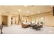 Finished basement living area with a plush sofa, recessed lighting, and neutral carpet at 1405 Saratoga Woods Dr, Waxhaw, NC 28173