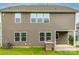 The backyard shows a grilling station and covered patio at 150 W Morehouse Ave, Mooresville, NC 28117