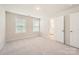 Bright bedroom with carpeted floors and a view to the bathroom at 1540 Croydon St, Indian Land, SC 29707