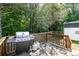 Outdoor wooden deck with grill, ideal for entertaining guests at 159 Pitts School Nw Rd, Concord, NC 28027