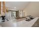 Open-concept kitchen and dining area featuring a central island, and built in cabinets for storage at 159 Pitts School Nw Rd, Concord, NC 28027