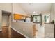 View of the kitchen and dining area, showcasing an open layout with natural light and hardwood floors at 159 Pitts School Nw Rd, Concord, NC 28027
