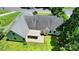 An aerial view of a home with a covered patio, showcasing outdoor living space and architectural details at 185 Eastcliff Se Dr, Concord, NC 28025