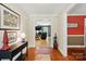 Welcoming entryway with hardwood floors leading into the living area at 185 Eastcliff Se Dr, Concord, NC 28025