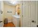 Functional laundry room with washer, dryer, cabinet storage, and easy access at 185 Eastcliff Se Dr, Concord, NC 28025