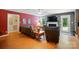 Comfortable living room with a fireplace and laminate wood flooring at 185 Eastcliff Se Dr, Concord, NC 28025