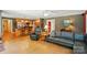 Spacious living room open to kitchen with wood floors, and lots of natural light at 185 Eastcliff Se Dr, Concord, NC 28025