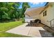 Relaxing patio with furniture and retractable awning perfect for outdoor entertaining at 185 Eastcliff Se Dr, Concord, NC 28025
