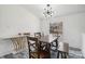 Contemporary dining area with a wooden table, unique lighting, and modern floors at 2315 Circle Dr, Great Falls, SC 29055