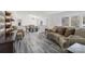 Open-concept living room flowing into the dining area, featuring modern floors and neutral decor at 2315 Circle Dr, Great Falls, SC 29055