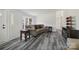 Bright living room with stylish wood floors, bay window, and a cozy sofa at 2315 Circle Dr, Great Falls, SC 29055