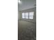 Spacious carpeted bedroom with three bright windows at 2924 Sedona Pl, Fort Mill, SC 29708
