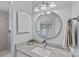 Bathroom with granite countertop, large mirror, modern fixtures, and tiled shower at 3308 Selwyn Farms Ln # 5, Charlotte, NC 28209