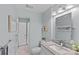 Well-lit bathroom features a granite vanity, modern fixtures, and tiled floor at 3308 Selwyn Farms Ln # 5, Charlotte, NC 28209
