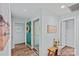 Bright entryway with hardwood floors, fresh paint, decorative accents, and plenty of natural light at 3308 Selwyn Farms Ln # 5, Charlotte, NC 28209