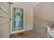 Charming entrance with a decorative wreath and welcome mat, creating a warm and inviting curb appeal at 3308 Selwyn Farms Ln # 5, Charlotte, NC 28209