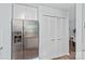 Modern kitchen featuring stainless steel appliances, white cabinetry, and a bright, airy atmosphere at 3308 Selwyn Farms Ln # 5, Charlotte, NC 28209