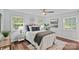 Bright main bedroom with large windows, ceiling fan, and neutral decor at 3308 Selwyn Farms Ln # 5, Charlotte, NC 28209