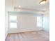 Spacious bedroom featuring plush carpeting, recessed lighting and bright windows at 4009 Lawnview Dr, Charlotte, NC 28269