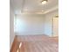 Bright bedroom featuring plush carpeting, recessed lighting and a large window at 4009 Lawnview Dr, Charlotte, NC 28269