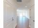 Inviting foyer with hardwood floors leading to an open-concept living area at 4009 Lawnview Dr, Charlotte, NC 28269