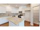 Beautiful kitchen with white cabinets, granite countertops, and stainless steel appliances at 4009 Lawnview Dr, Charlotte, NC 28269