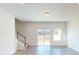 Bright living room featuring hardwood floors and sliding glass doors to the outside at 4009 Lawnview Dr, Charlotte, NC 28269