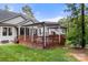 Backyard showcasing a deck with gazebos and string lights, creating a relaxing outdoor space at 4189 Island Fox Ln, Denver, NC 28037