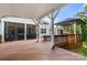 Expansive backyard deck with gazebos, outdoor seating, and string lights for evening gatherings at 4189 Island Fox Ln, Denver, NC 28037