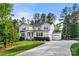 Charming two-story home with a well-manicured lawn, attached garage, and wide driveway at 4189 Island Fox Ln, Denver, NC 28037