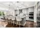 Modern kitchen with granite countertops, stainless steel appliances, and a large island at 4189 Island Fox Ln, Denver, NC 28037