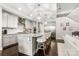 Updated kitchen features granite counters, stainless appliances, and a central island with seating at 4189 Island Fox Ln, Denver, NC 28037