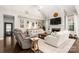 Bright living room with high ceilings, a fireplace, and stylish decor at 4189 Island Fox Ln, Denver, NC 28037