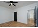 A clean bedroom showcasing hardwood flooring and ample natural light at 420 Sloop St, China Grove, NC 28023