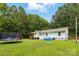 Lush backyard with recreational elements at 4230 Train Chaser Pl, Indian Land, SC 29707