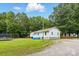 Sprawling backyard with play equipment at 4230 Train Chaser Pl, Indian Land, SC 29707