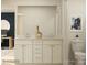 Well-lit bathroom featuring a double vanity, large mirror, and modern fixtures at 4262 Skyboat Cir, Fort Mill, SC 29715