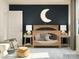 Charming Bedroom featuring a crib, rocking chair, and soft lighting, creating a cozy atmosphere at 4262 Skyboat Cir, Fort Mill, SC 29715