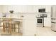 Spacious kitchen featuring stainless steel appliances, a center island, and counter seating at 4262 Skyboat Cir, Fort Mill, SC 29715
