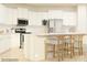 Modern kitchen with stainless steel appliances, a center island, and bright white cabinets at 4262 Skyboat Cir, Fort Mill, SC 29715
