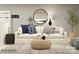 Relaxing living room showcasing a modern sofa, round coffee table, and decorative accents at 4262 Skyboat Cir, Fort Mill, SC 29715