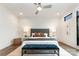 Serene bedroom with a ceiling fan, hardwood floors, and neutral decor, creating a calm retreat at 428 E 33Rd St, Charlotte, NC 28205