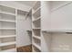 Large walk-in closet with custom shelving and ample storage space for organization at 428 E 33Rd St, Charlotte, NC 28205