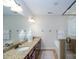 Bathroom featuring double sinks, granite counters, a shower, and a tub at 4323 Bright Rd, Charlotte, NC 28214