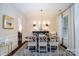 Elegant dining room featuring a large table and tasteful decor at 4323 Bright Rd, Charlotte, NC 28214
